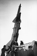 Training of the crew of an anti-aircraft defense unit, soviet sa-2 (sam-2) surface-to-air missile during military exercises, 1972.
