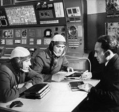 Soyuz 12, soviet cosmonauts oleg makarov and vasili lazarev being briefed before a training flight in a simulator at the yuri gagarin cosmonauts training center, october 1973.