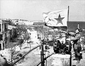 The raising of the soviet military banner of the navy in liberated sevastopol, 1944.