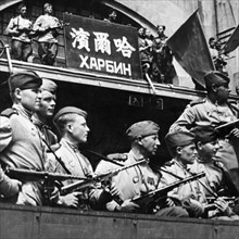 Operation august storm (battle of manchuria), soviet troops hoisted the flag of victory over the harbin railway station, manchuria, august 19, 1945.