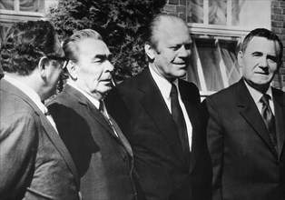 Leonid brezhnev, general secretary of cpsu central committee met with u,s, president gerald ford at european security and cooperation conference in hensinki, finland, july 30, 1975, far left: henry ki...