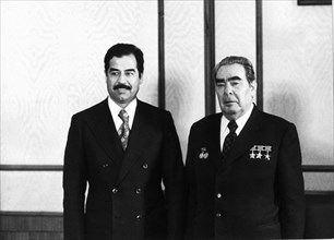 Leonid brezhnev (right) general secretary of the cpsu central committe with saddam hussein, deputy general secretary of the arab socialist renaissance party (baath party), kremlin, moscow, ussr, febru...
