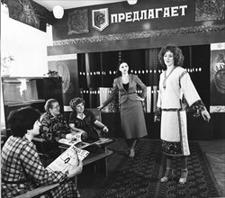 Tailors and seamstresses in the gas field town of vuktyl discuss new fashion dresses, komi autonomous sovit socialist republic, ussr 1982.
