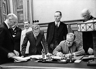 Vyacheslav molotov, chairman of the people's commissars' council and people's commissar for foreign affairs, signing of the treaty of non-aggression between germany and the union of soviet socialist r...