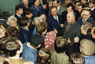 Mikhail gorbachev meeting with workers of a shipbuilding plant in leningrad in 1987, they are on the verge of launching the icebreaker 'october revolution'.