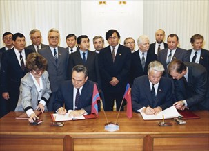 Chairman of the supreme soviet of the russian federation, boris yeltsin and president of kazakhstan, nursultan nazarbayev during the ceremony of signing the treaty between the russian federation and k...