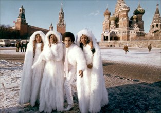 Boney m in red square, moscow during their tour of the ussr in december, 1978, bobby farrel with liz mitchell, mizy williams, and marcia barret.