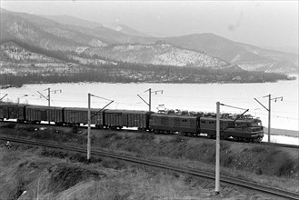 Irkutsk region, russia, a freight train makes its way on the trans-siberian railway in the irkutsk region, october 1997.