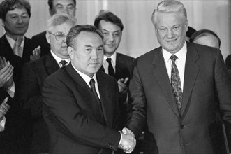 Moscow, president of russia boris yeltsin (r) and president of kazakhstan nursultan nazarbayev are pictured after signing the treaty, may 25, 1992.