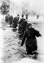 Nazi german troops retreat from their bridgehead near the city of demyansk, in march, 1943.
