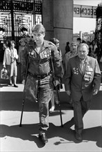 An afghan war veteran and a world war ll veteran arriving at gorky park for a victory day celebration on may 9, 1989.