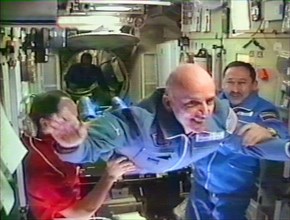 Moscow, russia, april 30, 2001, first space tourist, u,s, national dennis tito (c) has just passed into the international space station on monday.