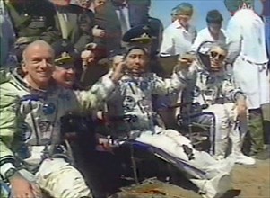 May 6, 2001, american multimillionaire dennis tito, 60, (left) following an eight-day space flight which cost him 20 million dollars, safely returned on sunday to earth together with his russian crewm...