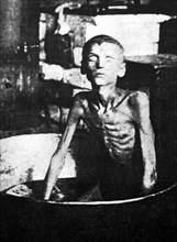 Death of starvation in kharkov, 1933' is on view at the exhibition 'declassified memory' in kiev, where documents from the archives of the ukrainian security service on golodomor, or the engineered fa...