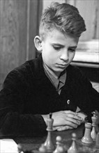 Leningrad, ussr, young chess player boris spassky, march 12, 1948.