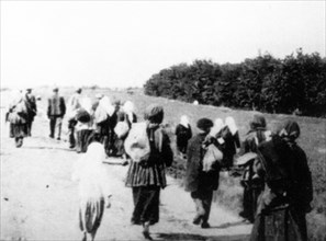 Documentary photograph by a, vinerberger, showing starved villagers who leave their settlements in search of food, displayed at an exhibition in kiev, dedicated to holodomor, the great ukrainian famin...