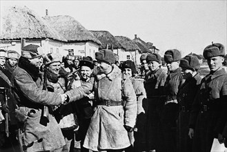 Kursk partisans meeting with soldiers of a soviet regular unit, kursk region, ussr, world war 2, july 1943.