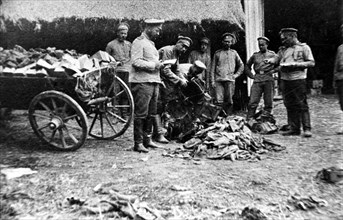 World war one, russia, orenburg cossacks share spoils of war, 1914 or 1915.