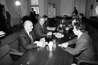 Ex-president of ussr mikhail gorbachev meets with i, baskin, a representative of the board of directors of the tikhnokhim company, april 25th, 1994, future president of russia, vladimir putin, sits on...