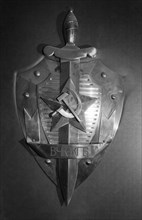 Sword and shield symbol of the kgb, soviet secret service, security and intelligence-gathering organization.
