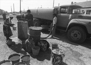 Port of muynak on the aral sea, 1988, since the inland aral sea dried up local people have difficulty obtaining fresh water.