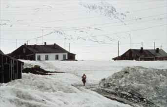 A chukchi girl coming home from school in the village of novoye chaplino in chukotka, russia.