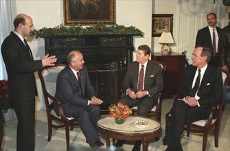 Mikhail gorbachev meeting with ronald reagan and george bush during his visit to the usa in 1987.
