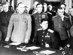 Marshal of the soviet union georgy zhukov (2nd from left), accept the surrender of nazi germany may 8, 1945.