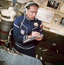 Soyuz 22, soviet cosmonaut vladimir aksyonov during communications with earth, 1976.