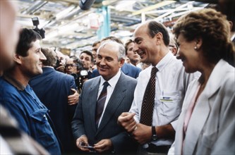 Mikhail gorbachev meeting with workers of the peugeot factory near paris during his visit to france, october 1985.