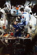 Cosmonauts vladimir kovalyonok (soyuz 29, right) and sigmund jahn from the gdr (soyuz 31) aboard the salyut 6 space station, august 1978.