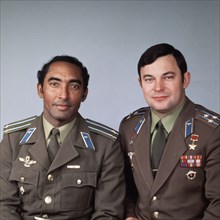 Crew of the soyuz-38 space mission to the salyut 6 space station, soviet cosmonaut colonel yuri viktorovich romanenko (right) and cuban researcher-cosmonaut lieutenant-colonel arnaldo tamayo mendez, s...