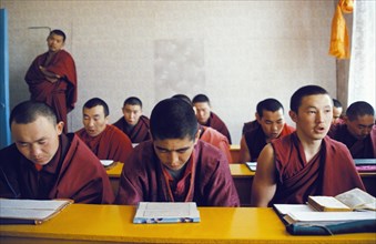 Students in a classroom at the buddhist institute of dashi choinkorlin in buryatia, siberia, russia, 1999.