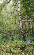 A cross marking alleged original burial site of tsar nicholas ll and the romanov royal family, yekaterinburg, russia, 1992.
