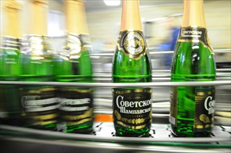 Moscow, russia, november 29, 2010, sovetskoye shampanskoye bottling line at kornet, a moscow-based champagne winery.