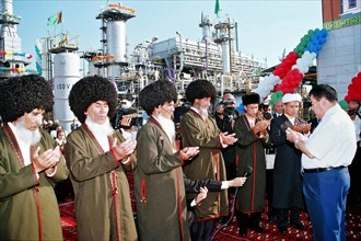 Turkmenistan, september 14,2005, muslim clergy, elders and president of turkmenistan saparmurat niyazov (r) pray during a solemn ceremony of launching the gas compressor station at korpeje oil and gas...