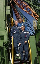 Baikonur, kazakhstan, september 27, 2005, the crew of the 12th expedition to the international space station, cosmonaut valery tokarev of russia (front) u,s, space tourist gregory olsen (middle) and a...