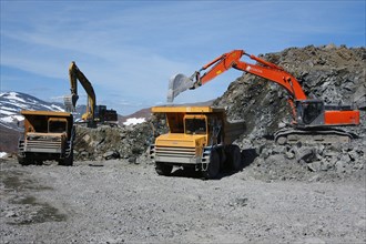 Chromite deposits of yamalo-nenets autonomous district, loading chromite ore onto  belaz dump trucks, november 2005.