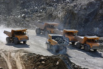 Chromite deposits of yamalo-nenets autonomous district, belaz dump trucks take out chromite ore, november 2005.