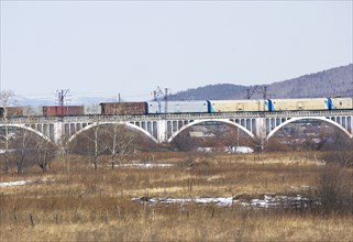 Amur region, russia, the picture shows a railway bridge at the skovorodino railway station along the trans-siberian railway, april 2006.