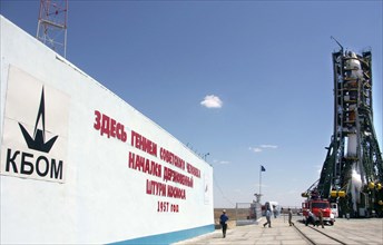 The resurs-dk1 remote sensing satellite is to launch aboard the soyuz-u rocket from baikonur cosmodrome in kazakhstan, june 16, 2006, the sign on the wall reads 'here, with the genius of the soviet pe...