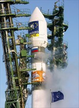A russian carrier rocket soyuz-fg with the first satellite of the european global positioning system galileo is about to blast off from a launch pad at the baikonur cosmodrome in kazakhstan, december ...