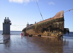 Murmansk region, russia, september 08, 2006, the decommissioned nuclear-powered submarine k-60 with a reactor aboard is transported on the dockwise (dutch heavy lift shipping company) semi-submersible...