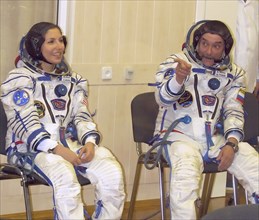 Baikonur, kazakhstan, september 18, 2006, first female space tourist anousheh ansari, left, and russian cosmonaut, flight engineer, mikhail tyurin (roskosmos) of the 14th iss crew seen before the laun...