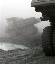 Oao 'kongor-chrom' mines, mining of chromium ore in the ural region of russia, belaz dump trucks, september 2006.