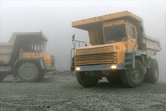 Oao 'kongor-chrom' mines, mining of chromium ore in the ural region of russia, belaz dump trucks, september 2006.