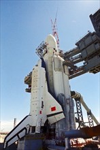 Baikonur cosmodrome, kazakh ssr, ussr, the launch vehicle 'energia' with the buran spacecraft on the launch pad, october 1988.