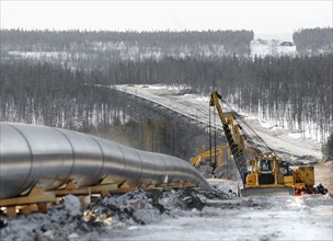 Yakutia, russia, march 21, 2007, a section of the eastern siberia-pacific ocean oil pipeline, the longest one in russia, is under construction, when completed, it will carry oil from eastern siberia t...