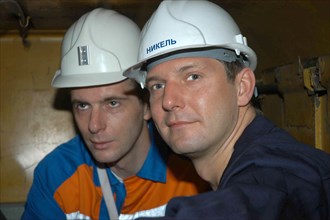 Norilsk, russia, march 21, norilsk nickel ceo mikhail prokhorov and companyi´s future ceo denis morozov, l-r, tour the oktyabrsky mine of the norilsk nickel.