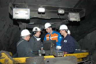 Norilsk, russia, march 21, 2007, norilsk nickel ceo mikhail prokhorov, second from right, and companyi´s future ceo denis morozov, right, talk to miners while touring the oktyabrsky mine of the norils...